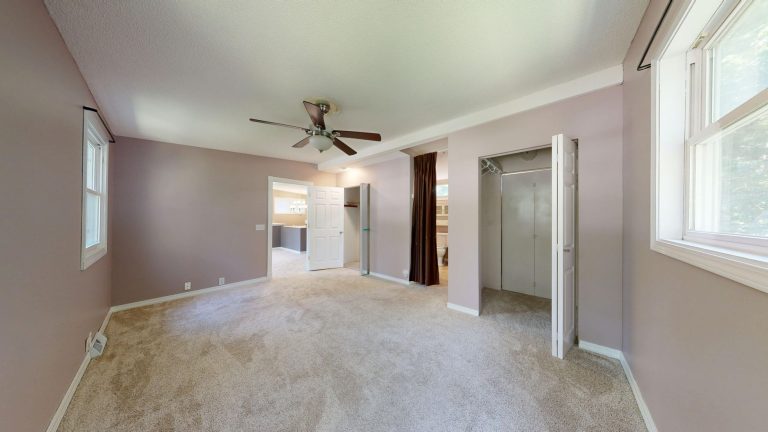 Neutral carpet flooring in a Colorado living room