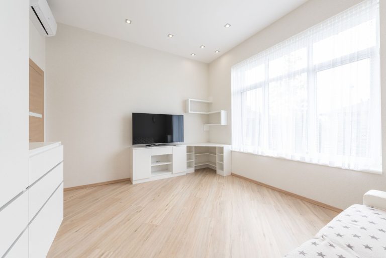 Light wood-look laminate flooring in a Colorado living room