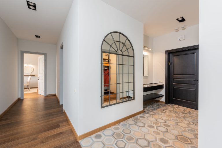 Patterned tile flooring in a Colorado entry hallway