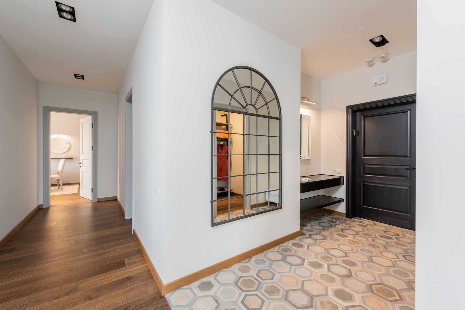 Patterned tile flooring in a Colorado entry hallway
